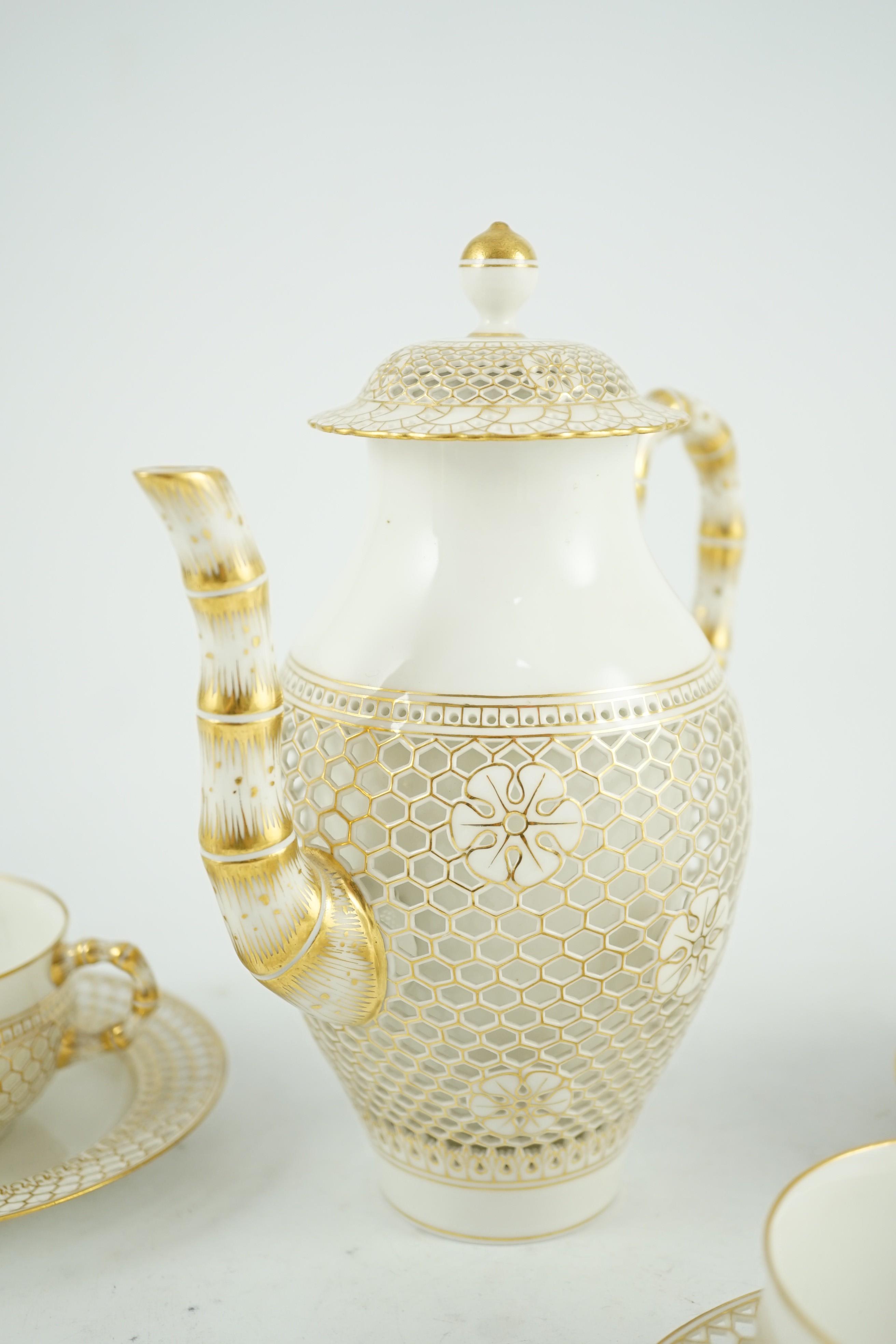 A Sevres reticulated part coffee set, early 20th century, coffee pot 19cm high